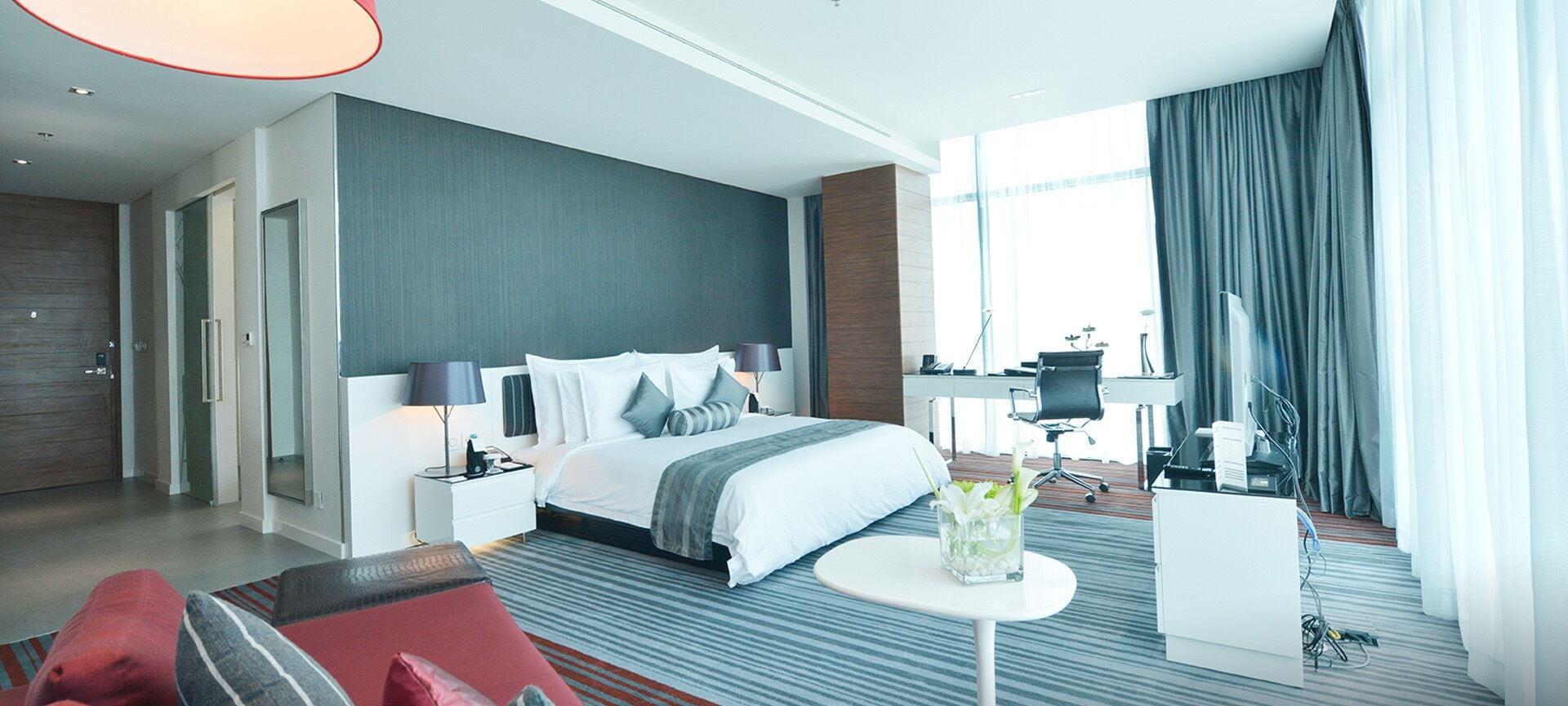 Ramee Grand Hotel And Spa Al-Manamah Bagian luar foto A bedroom in a hotel