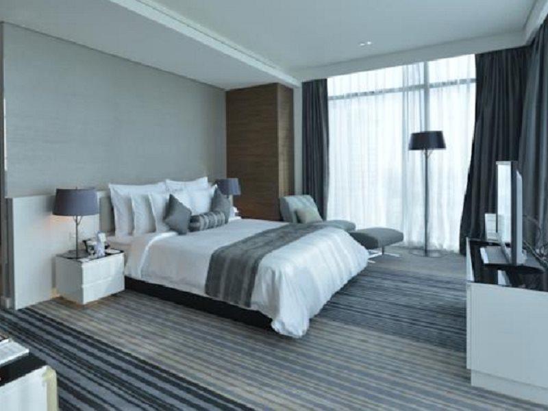 Ramee Grand Hotel And Spa Al-Manamah Bagian luar foto A bedroom at the hotel