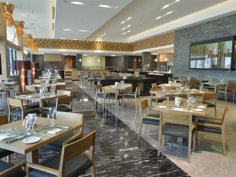 Ramee Grand Hotel And Spa Al-Manamah Bagian luar foto The restaurant