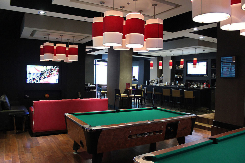 Ramee Grand Hotel And Spa Al-Manamah Bagian luar foto The Sports Bar at the Toronto International Centre